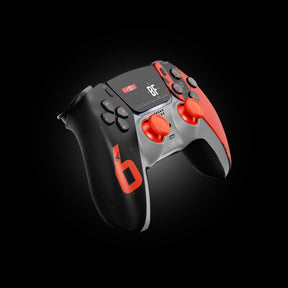 Angled view of a custom Battlefield 6-themed PlayStation controller with black and orange shell, BF logo display, and bright orange thumbsticks.