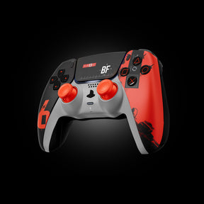 Right-side angle of a Battlefield 6-themed custom PlayStation controller with orange thumbsticks, BF logo display, and soldier silhouette on the grip.