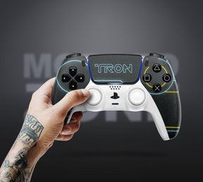 Vibrant gaming controller with 'TRON' design held by a person against a dark background